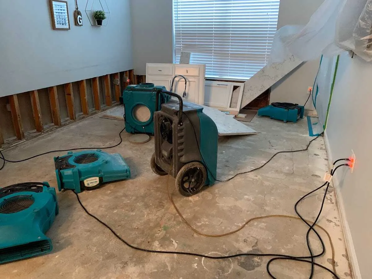 Dehumidifier in flood-cut room for Water Damage Restoration in West Bountiful
